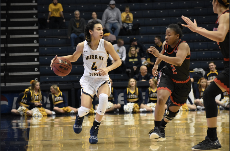 Freshman+guard+Lex+Mayes+looks+for+an+open+teammate+amidst+fullcourt+pressure.+%28Photo+by+Gage+Johnson%2FTheNews%29