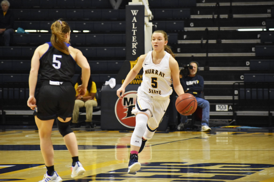 Freshman+guard+Macey+Turley+drives+up+the+floor+to+initiate+the+offense.+%28Photo+by+Gage+Johnson%2FTheNews%29