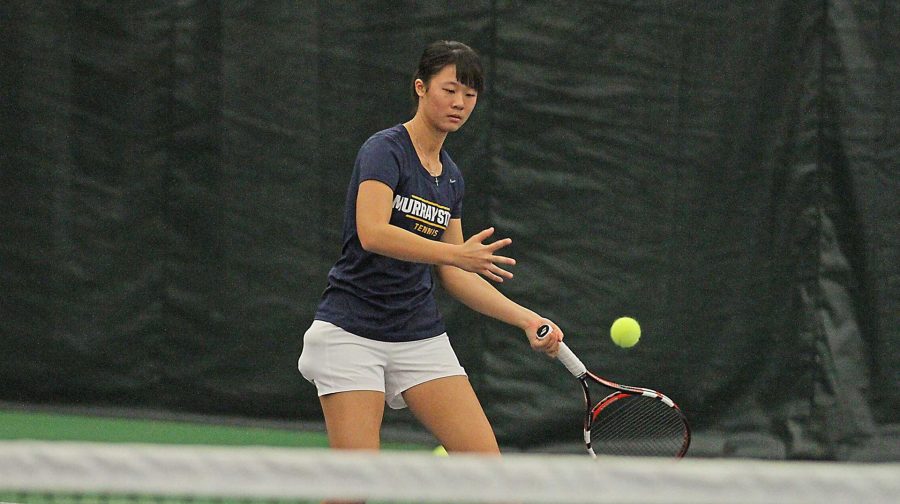 Junior Claire Chang returns the ball against Missouri State University. (Photo by Racer Athletics)