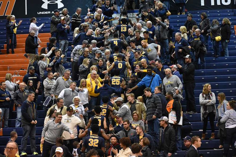 The Racers celebrate with fans after a road win against UT Martin. (Photo by Gage Johnson/TheNews)