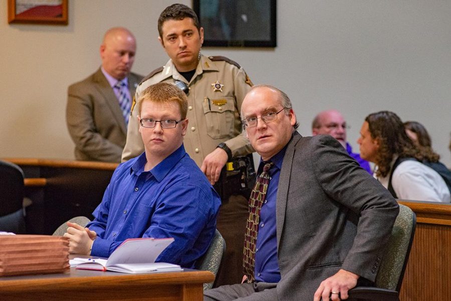 BENTON — Accused Marshall County High School shooter Gabe Parker (left) and defense attorney Tom Griffiths (right) prepare to exit the courtroom after Parkers status hearing in Friday, March 8. Parker will face trial beginning June 1 of next year, Marshall County Circuit Judge James Jameson ruled Friday. (DAVE THOMPSON/The Sun)