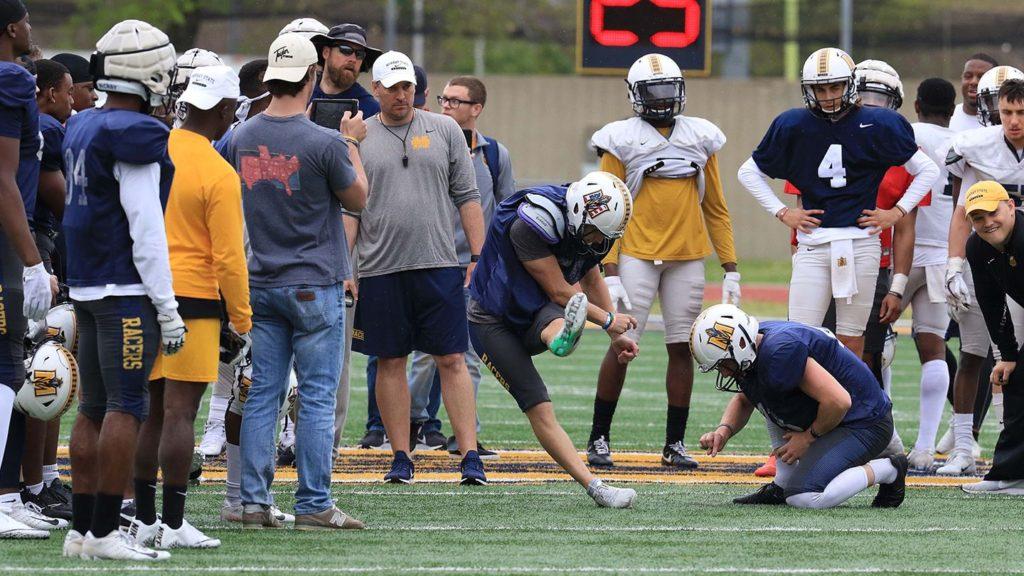 Sophomore kicker Colin Boyd attempts a field goal in a spring scrimmage. (Photo by Dave Winder/Racer Athletics)