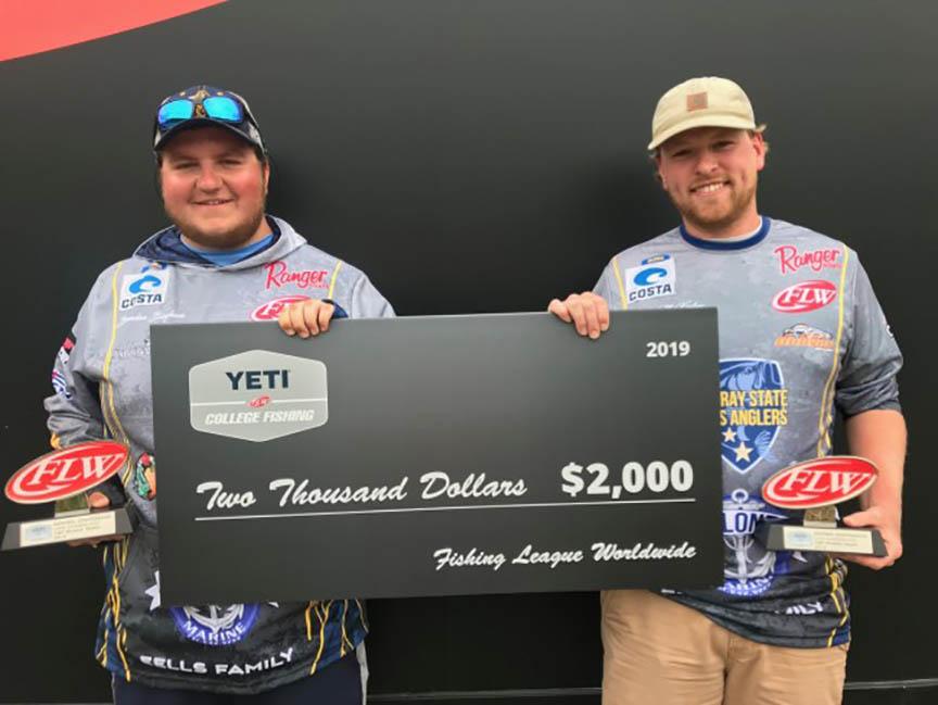 Team members Brenden Bingham and Hunter McKinley holding the grand prize of $2,000. (Photo courtesy of Murray State University)