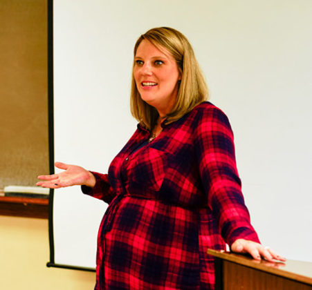 Professor Stephanie Anderson, who is expecting a son in December, teaches a journalism class. (Mackenzie O’Donley/The News)