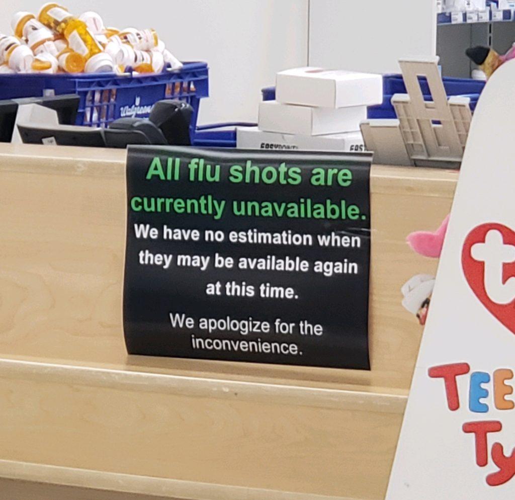 Customers are greeted with this sign at Walgreens alerting them that the pharmacy does not currently have flu shots. (Stephanie Anderson/The News)