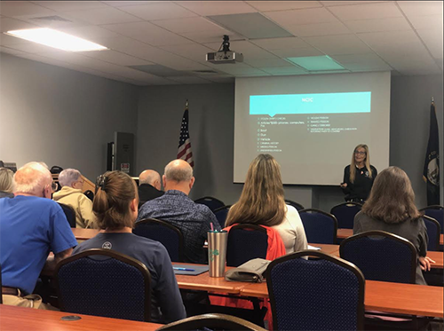 Telecommunicator Jill Hudson discussed her role in law enforcement at the Citizens Police Academy on Oct. 14. (Addison Watson/The News)