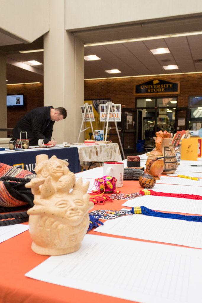 A plethora of international objects sit waiting for students to bid on them. (Mackenzie O’Donley/The News)
