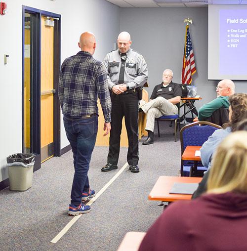 Brad Simmons, Citizens Police Academy attendee, participated in a field sobriety test. (Brock Kirk/The News)