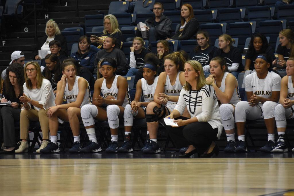 The Murray State womens basketball team watches as they take on Georgetown College. (Photo by Gage Johnson/TheNews)
