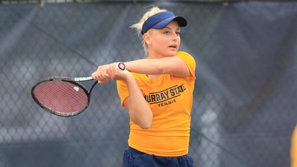 Freshman Samantha Muller watches the ball after she returns it. (Photo courtesy of Racer Athletics)