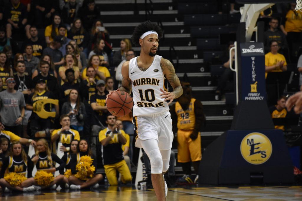 Sophomore+guard+Tevin+Brown+brings+the+ball+up+the+floor.+%28Photo+by+Gage+Johnson%2FTheNews%29