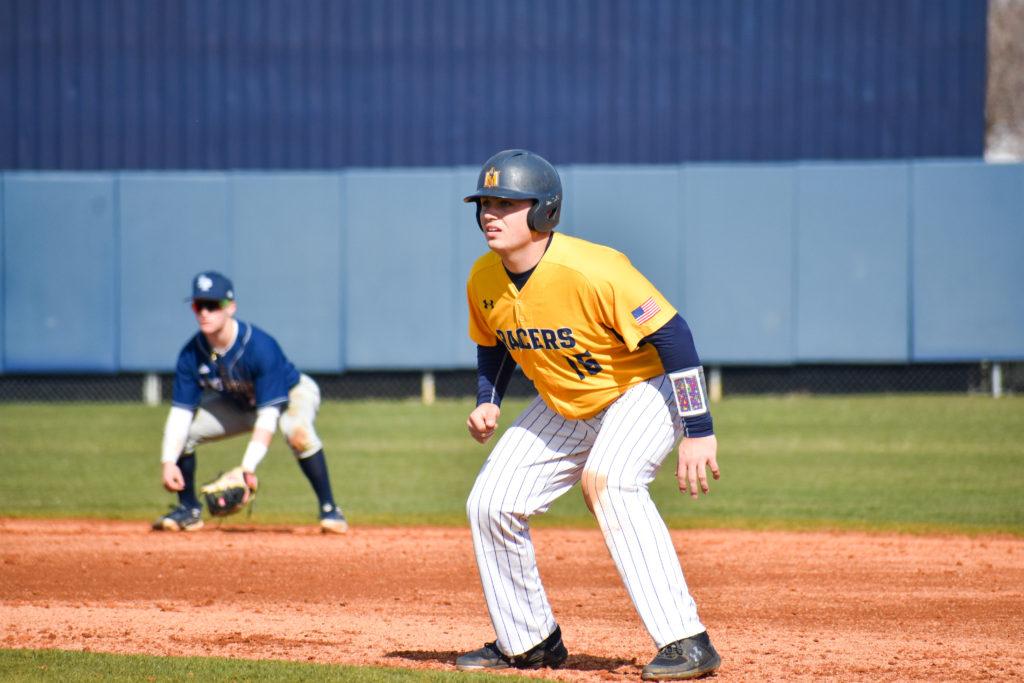 Senior catcher Bryan Chilton watches the pitch while on base. (Photo by Jillian Rush/The News)