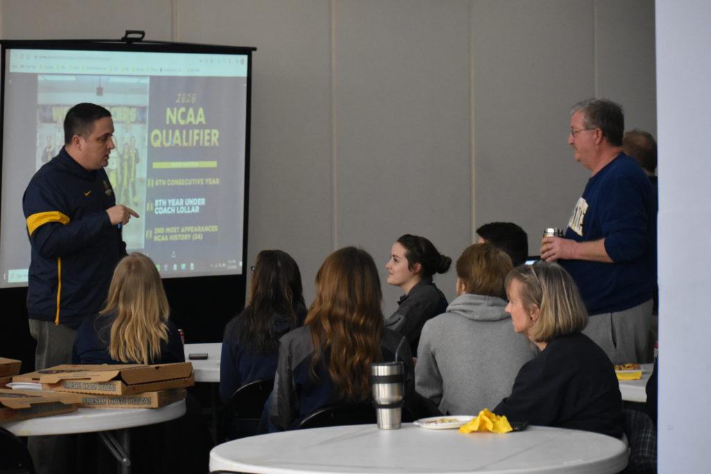 Murray State Athletic Director Kevin Saal meets with the Murray State rifle team during the NCAA Tournament Selection Show. (Photo by Nick Kendall/The News)
