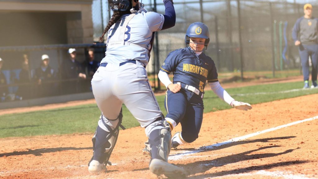 Sophomore left fielder Abby Shoulders slides into home plate. (Photo courtesy of Racer Athletics) 