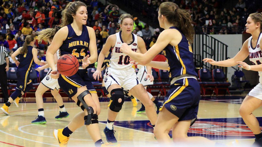 Sophomore forward Macie Gibson gets ready to hand the ball off to sophomore forward Alexis Burpo. (Photo courtesy of Racer Athletics)