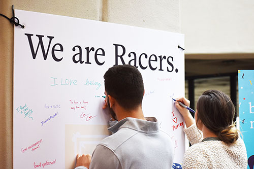 Students participate in reveal of Murray State’s new brand by writing what “We are Racers” means to them. (Elizabeth Erwin/The News)