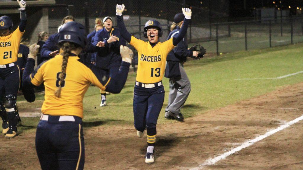 Sophomore second baseman Lindsey Carroll celebrates with her teammates. (Photo courtesy of Racer Athletics)