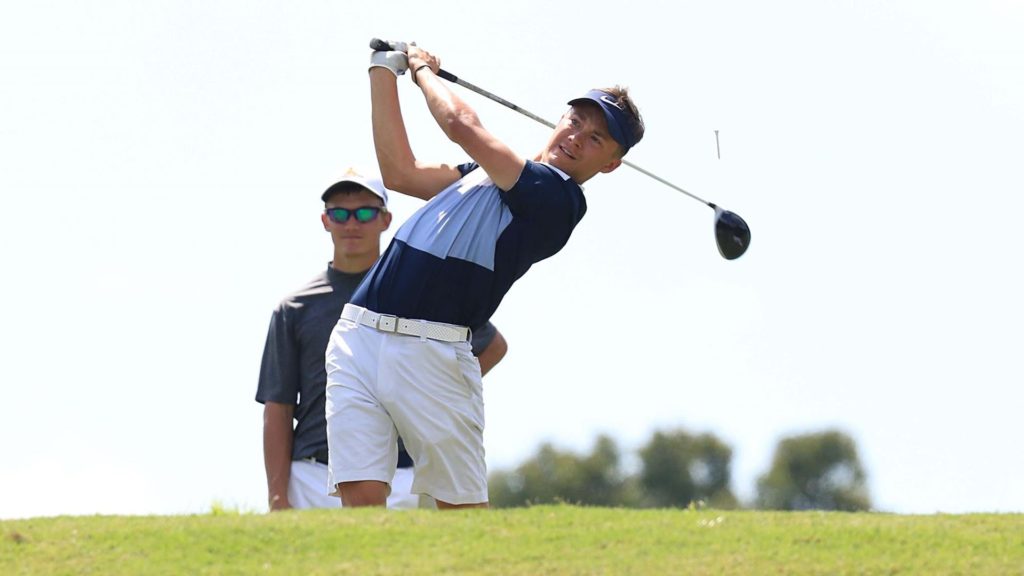 Junior Connor Coombs finishes his swing. (Photo courtesy of Racer Athletics)