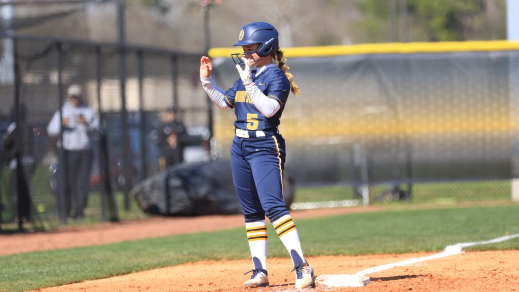 Sophomore+left+fielder+Abby+Shoulders+does+the+%E2%80%9CShoes+Up%E2%80%9D+sign+to+Murray+State%E2%80%99s+dugout+while+on+base.+%28Photo+courtesy+of+Racer+Athletics%29