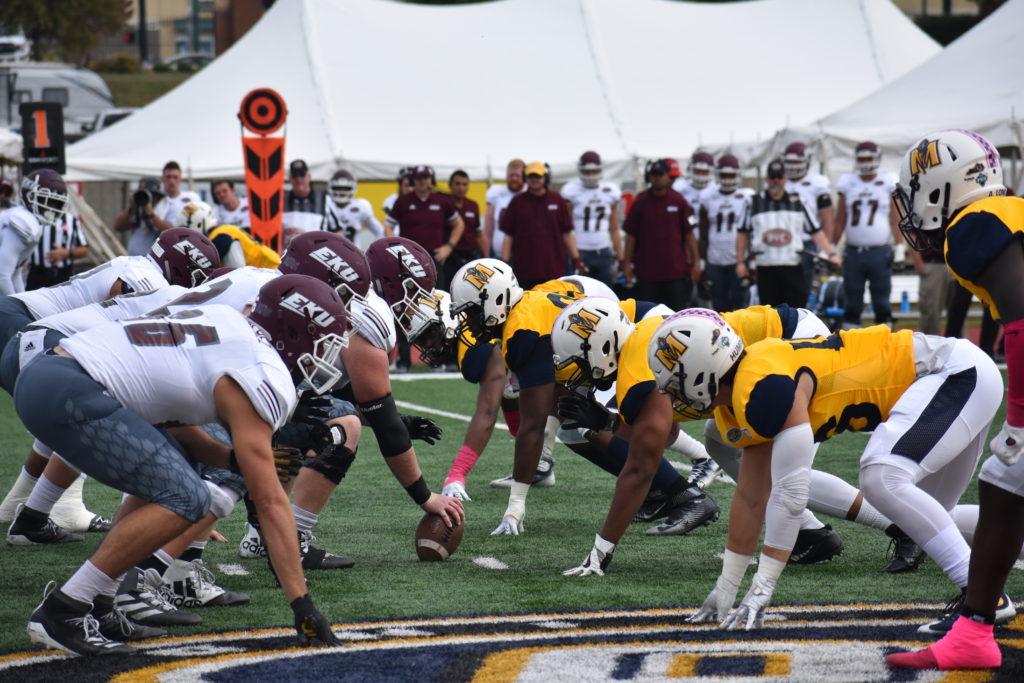 The Murray State defense lines up against EKU before a play. (Photo courtesy of Lauren Morgan/TheNews)