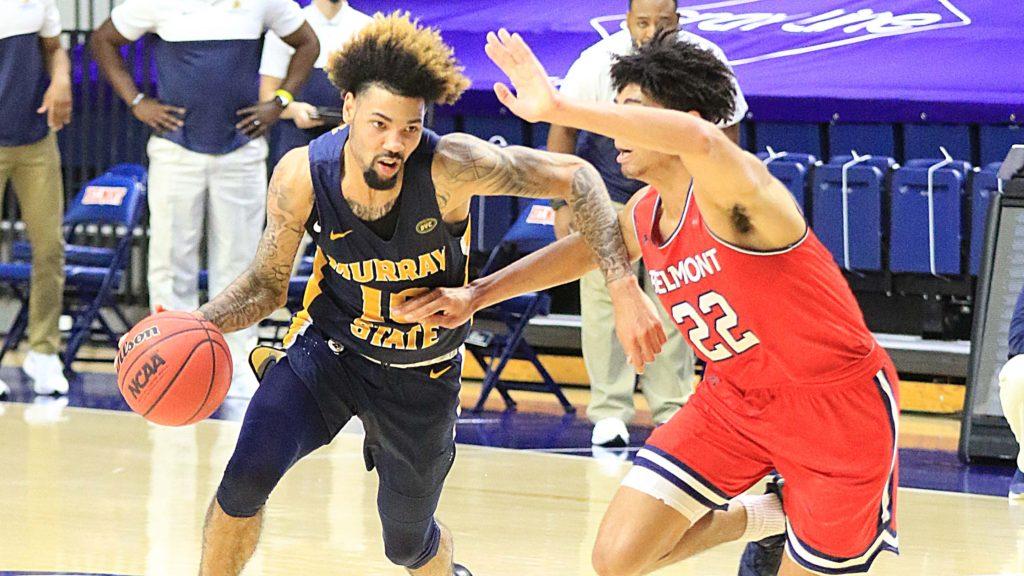 Junior guard Tevin Brown drives to the paint against Belmont. (Photo courtesy of Racer Athletics)
