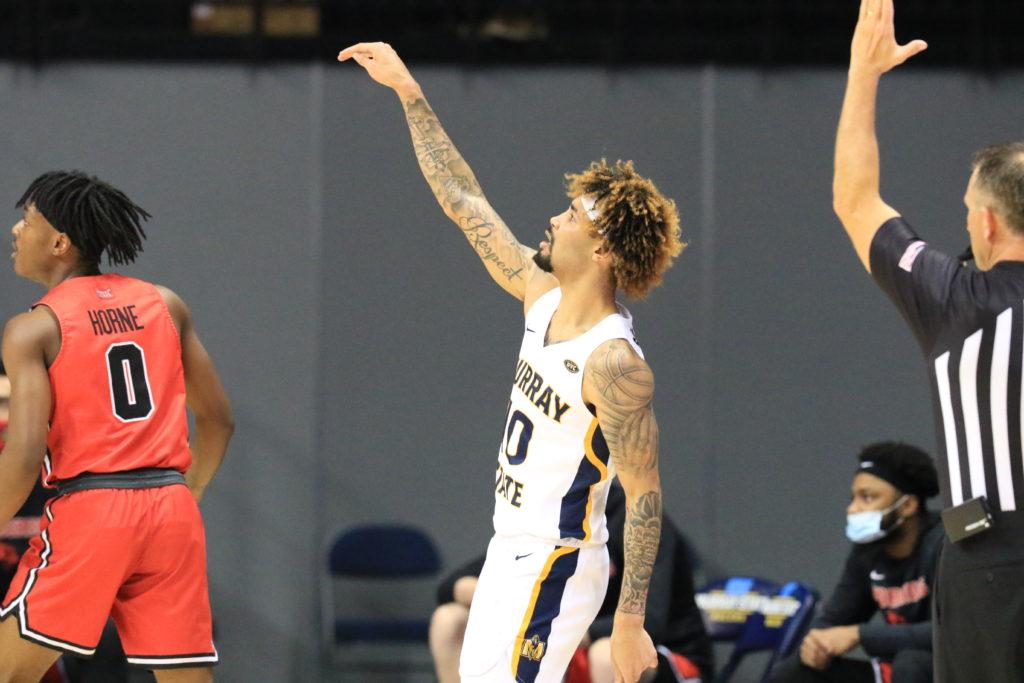 Junior guard Tevin Brown holds his follow through after shooting a three against Illinois State, (Photo courtesy of Racer Athletics)