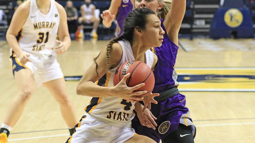Junior guard Lex Mayes drives baseline against Tennessee Tech. (Photo courtesy of Dave Winder/Racer Athletics)