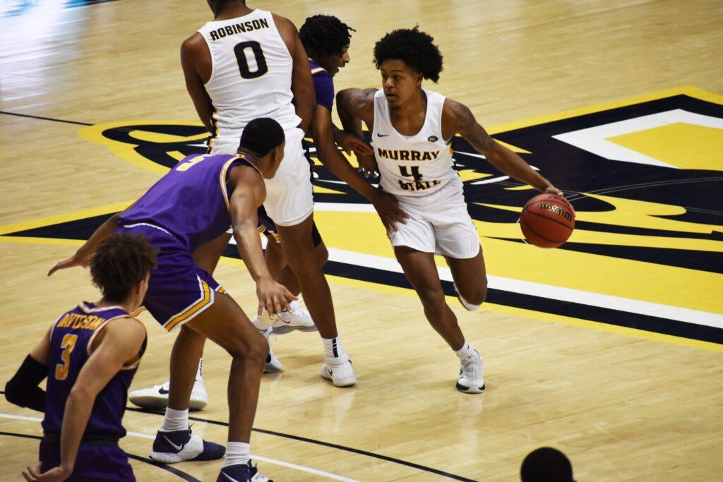 Freshman+guard+Dionte+Bostick+runs+a+pick-and-roll+with+sophomore+forward+Demond+Robinson.+%28Photo+courtesy+of+Gage+Johnson%2FTheNews%29