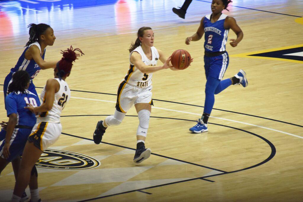 Junior guard Macey Turley passes to an open shooter in the corner. (Photo courtesy of Gage Johnson/TheNews)