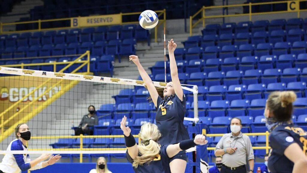 Senior setter Callie Anderton sets a teammate up for an attack. (Photo courtesy of Morehead State athletics)