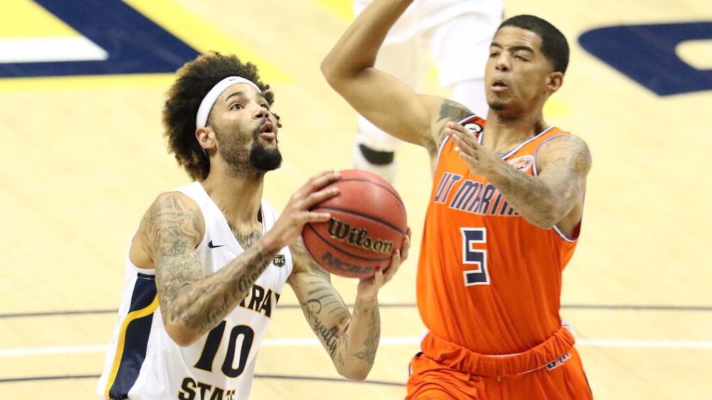 Junior guard Tevin Brown goes up against UT Martin. Brown would finish the game with 25 points. (Photo courtesy of Racer Athletics)