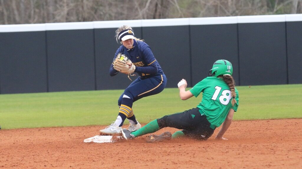 Junior infielder Lindsey Carroll attempts to turn a double play against University of North Dakota. (Photo courtesy of Racer Athletics)