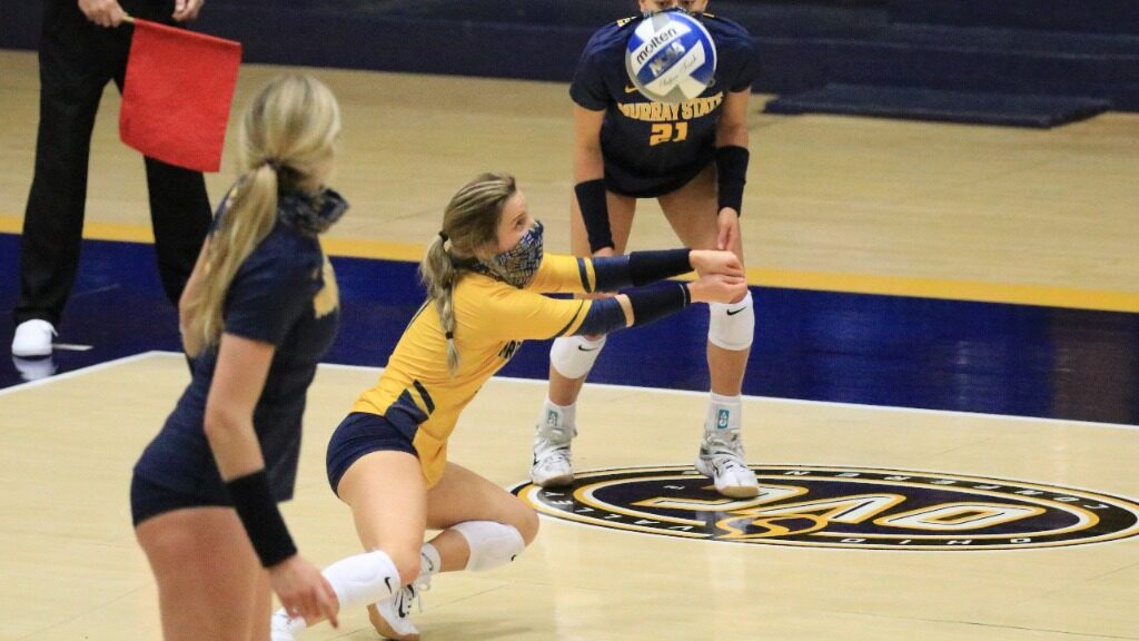 Junior libero Becca Fernandez makes a diving pass against Tennessee State. (Photo courtesy of Racer Athletics)
