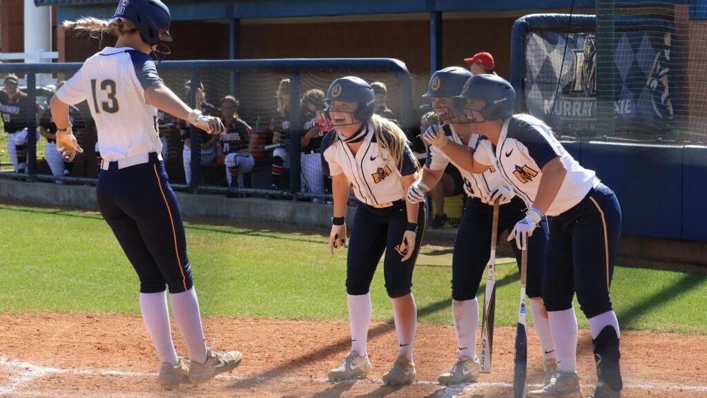 Junior+infielder+Lindsey+Carroll+touches+home+plate+after+blasting+a+three-run+home+run+against+Austin+Peay.+%28Photo+courtesy+of+Dave+Winder%2FRacer+Athletics%29