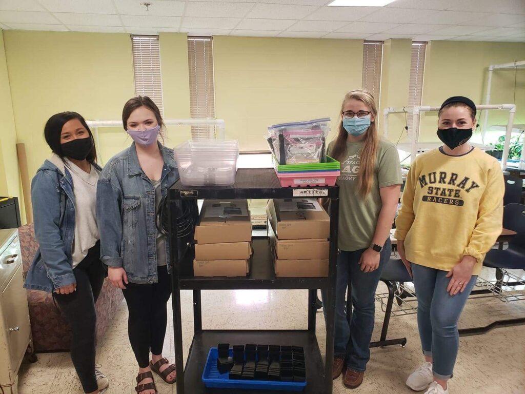 From left to right, students Cassity Mitchell, Mika Hankins, Alyssa Trombetti, and Presley Woodrum have been teaching about planting seeds and agriculture at Murray Elementary School. (Photo courtesy of Presley Woodrum)