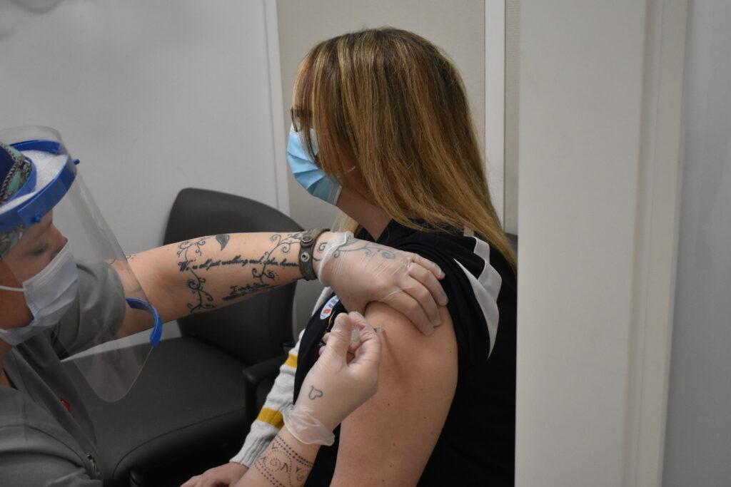 Stephanie Anderson, assistant professor and faculty adviser for The News, received her COVID-19 vaccine at Walgreens on Wednesday, March 3. (Gage Johnson/The News )