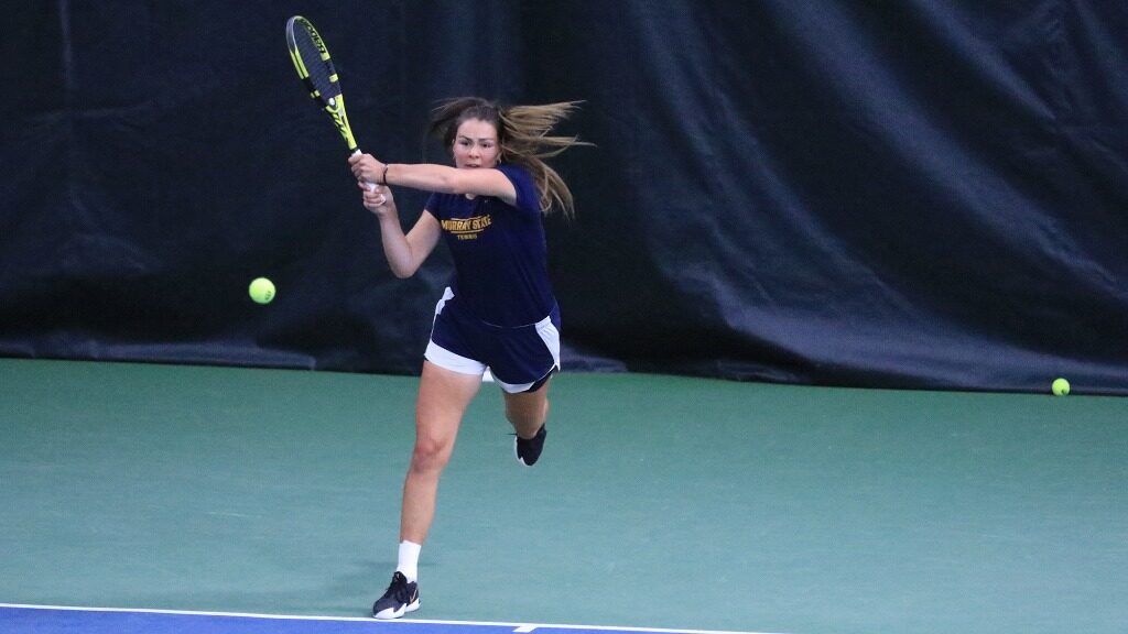 Senior Anja Loncarevic makes a strong two-handed return during a set in the OVC Tournament match against Austin Peay. (Photo courtesy of Racer Athletics)