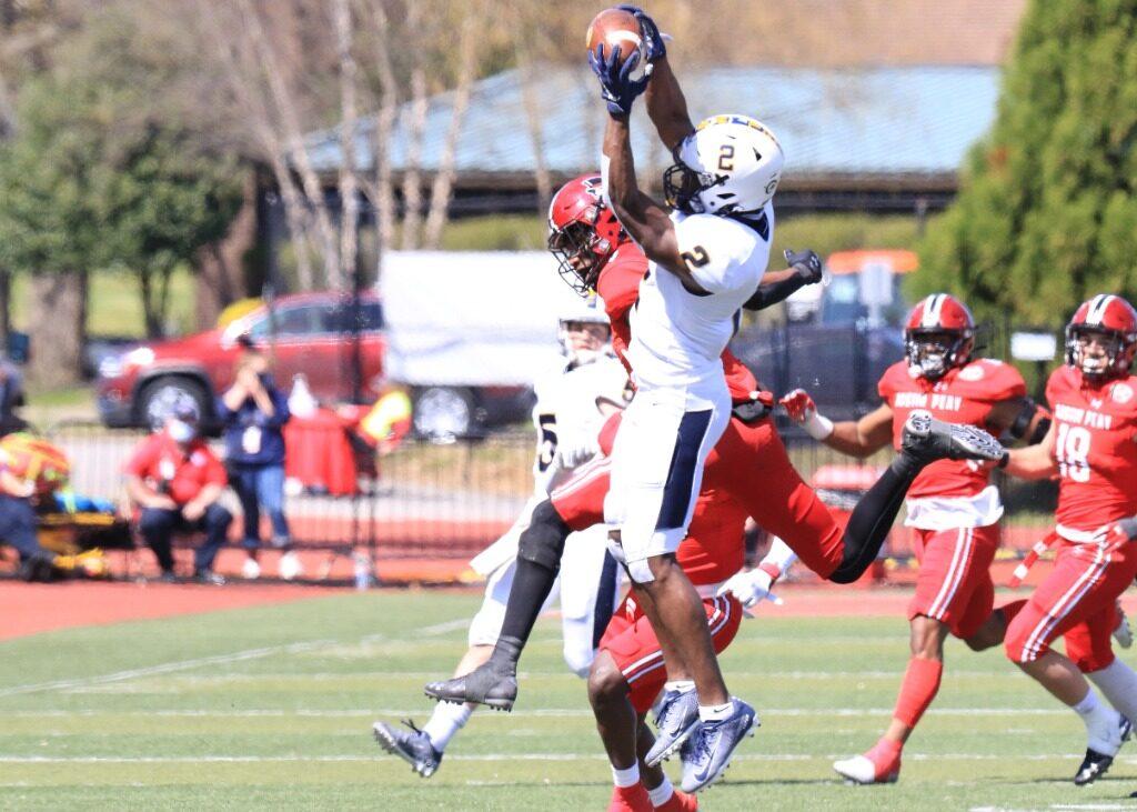 Redshirt-senior wide receiver Malik Honeycutt pulls down a pass against Austin Peay. (Photo courtesy of Dave Winder/Racer Athletics)