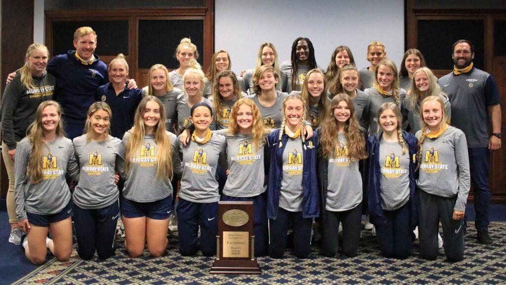 The Murray State soccer team poses with their Regular Season Championship trophy. (Photo courtesy of Racer Athletics)