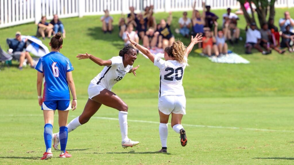 Senior midfielder Symone Cooper (center) tallied two goals in the Racers second win of the season. Photo courtesy of Racer Athletics.
