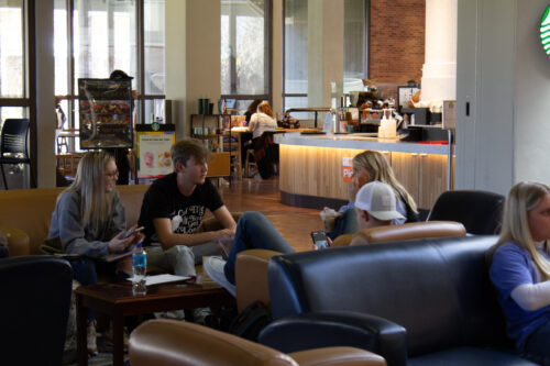 Students sit in the Starbucks dining room in Curris Center without masks. Administration lifted the campus mask mandate on Feb. 28 (Rebeca Mertins Chiodini/The News).