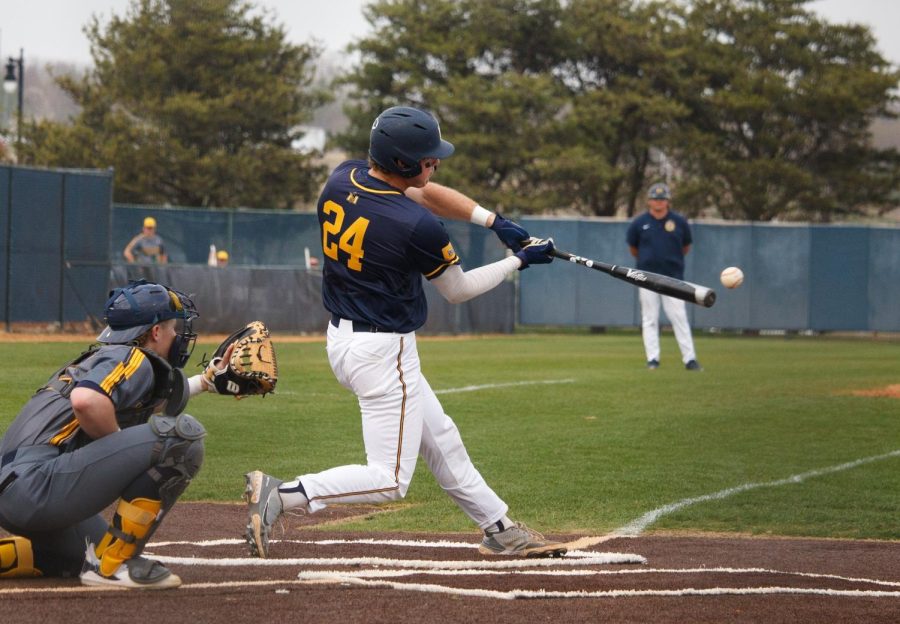 Junior+catcher+Taylor+Howell+hits+a+home+run+in+the+first+inning+in+game+two+against+Kent+State.+Photo+by+Rebeca+Mertins+Chiodini%2FThe+News.