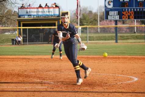 Senior right handed pitcher Hannah James throws a strike, leading to one of her 13 strikeouts in the Racers win over the Belmont Bruins on Tuesday, April 11. Photo by Rebeca Mertins Chiodini/The News.