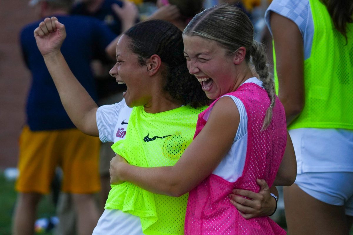 Senior Camille Barber and sophomore Hayley Hogenmiller celebrate after Mary Hardys goal. 