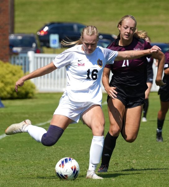 Senior forward Chloe Barnthouse takes a shot on goal. 