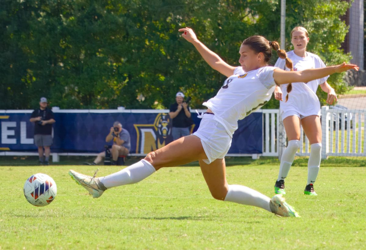 Sophomore Sydney Etter tries to maintain possession of the ball. 