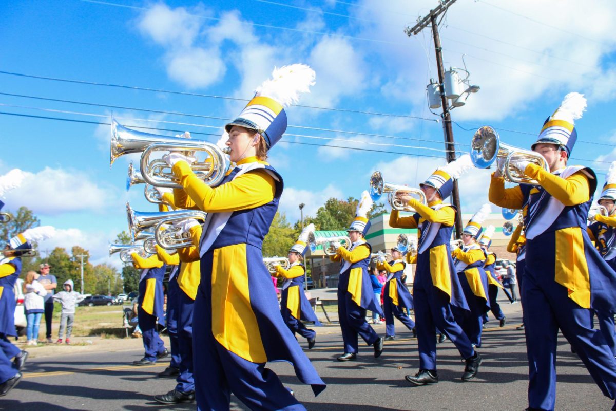 Racer Band marches in the Homecoming Parade. 