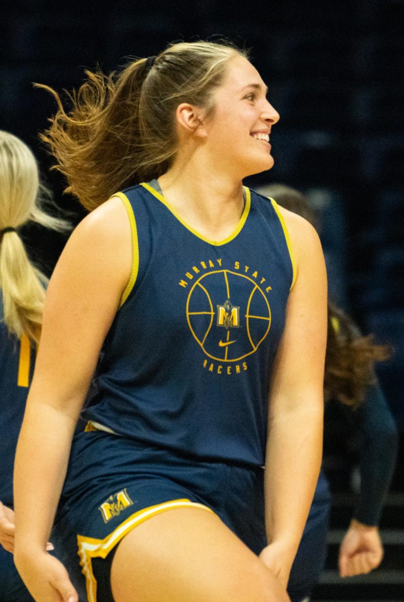 Senior forward Katelyn Young smiles during the Racers first practice.
