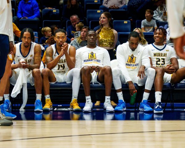 The Racers’ starting lineup prepares to be announced before the game.
