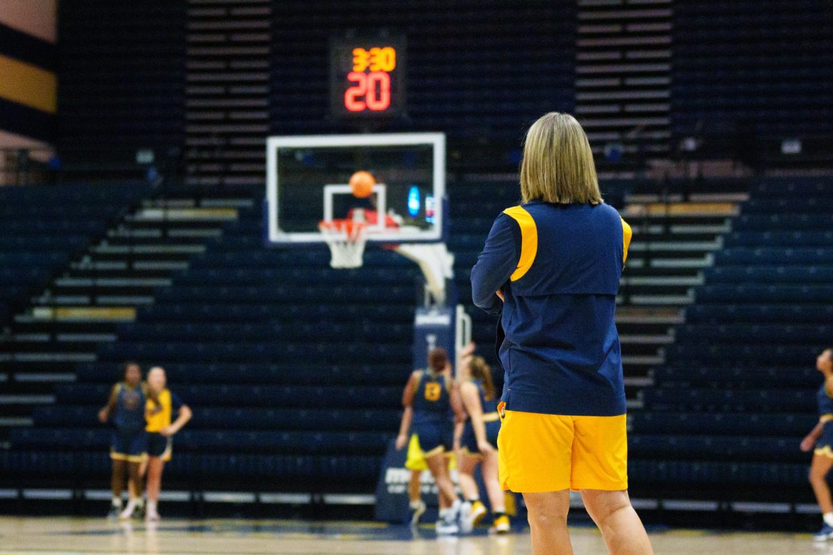 Head Coach Rechelle Turner looks on during the Racers frst official practice of the season.